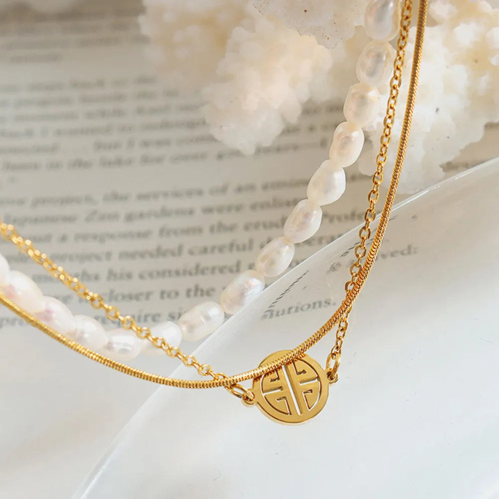 Poe Vai Bracelet – Titanium Steel with Freshwater Pearls